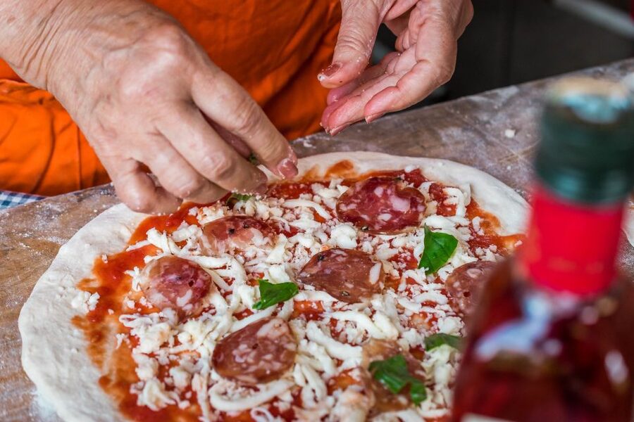 Sorrento: Pizza Making Class - Stretching, topping, and using the traditional oven