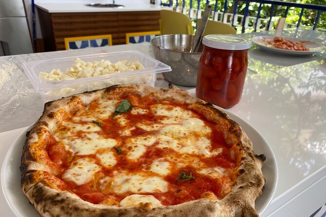 Sorrento Pizza School Activity in Italy - A pizza lesson with Mount Vesuvius on the horizon