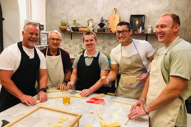Super Fun Pasta & Gelato Class by Vatican with Wine + Oil Tasting - Making pasta by hand with a rolling pin