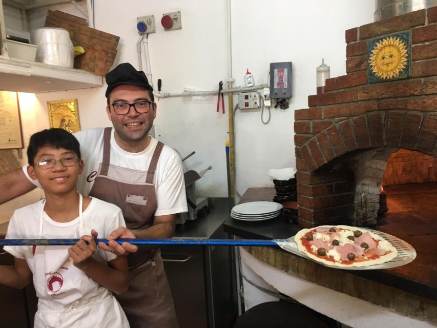 Taormina: Half-Day Pizza Making Class - Eating your pizza with bruschetta, wine, and dessert