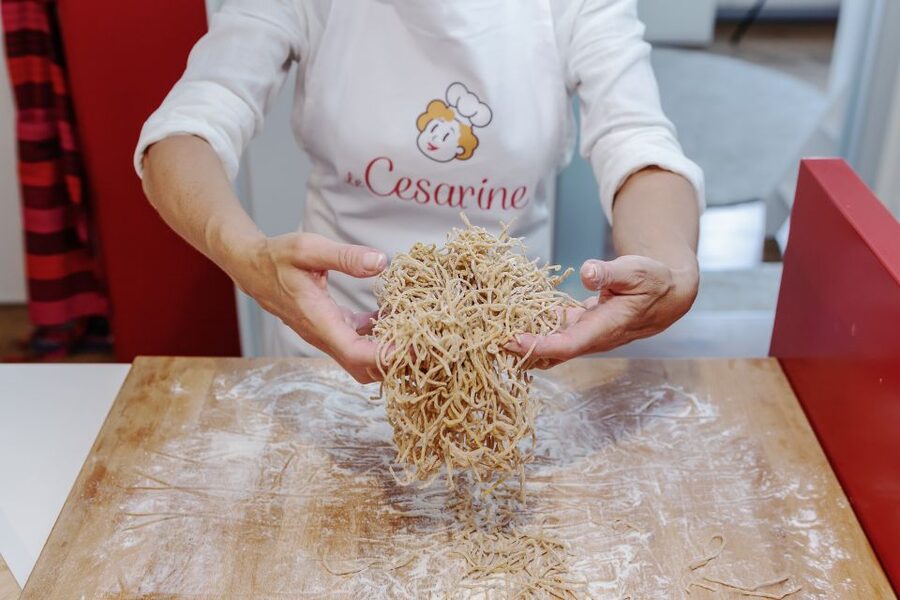 Taormina: Pasta & Tiramisu Cooking Class at a Local's Home - Rolling pasta in a Taormina home