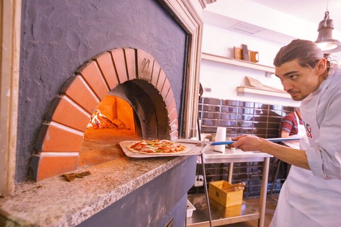 The Italian Way: Pizza and Gelato Class with Unlimited Wine - Making pizza in central Florence