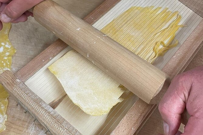 Venice Cooking Class in Mestre Pasta and Tiramisu Wine - Sitting down to eat what you made