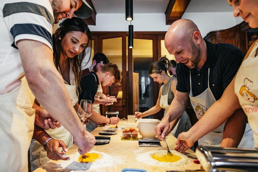 Venice: Pasta and Tiramisu Cooking Class at a Local's Home - Sitting down to eat your own work