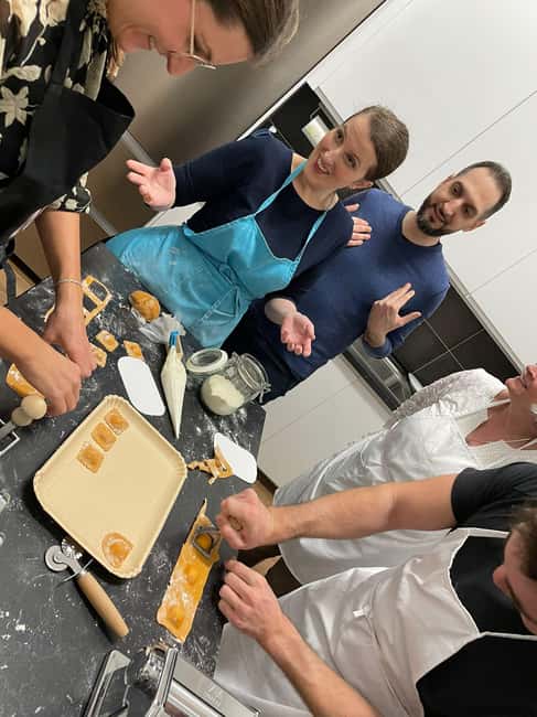 Verona: Authentic Pasta Making Class with a Local Family - Sitting down to eat what you made